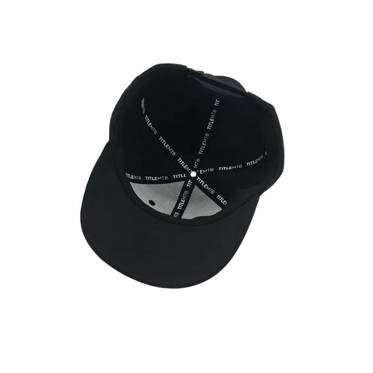 Black cap with white text on a light gray background